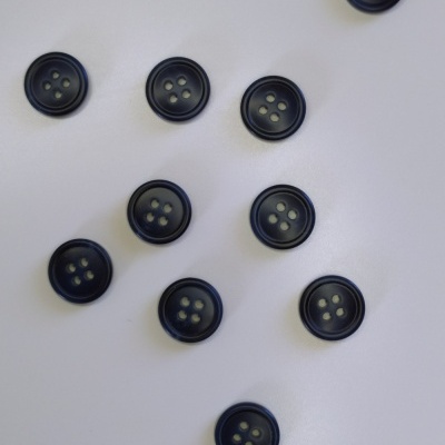 Dez botões azuis com quatro furos sobre fundo branco e texto 'Azul'.