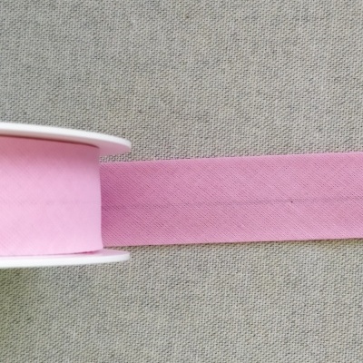 Fita rosa em rolo com fundo cinza e texto 'Rosa'