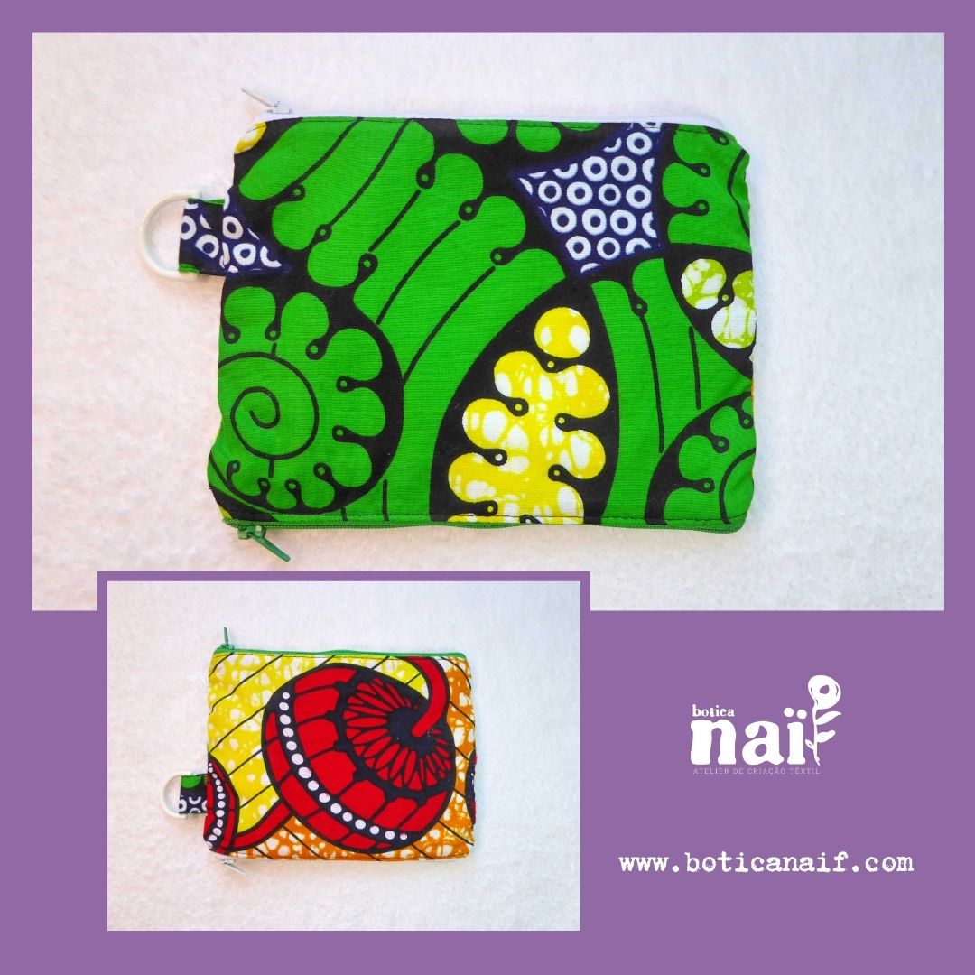 Bolsas Duplas “Usa-Lava”: Porta-pensos/lingerie/lenços/máscaras Duas carteiras de tecido colorido com padrões africanos, fechadas por zíper, em fundo branco.