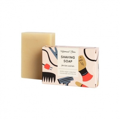 Sabonete de barbear embalado à esquerda com caixa ilustrada colorida