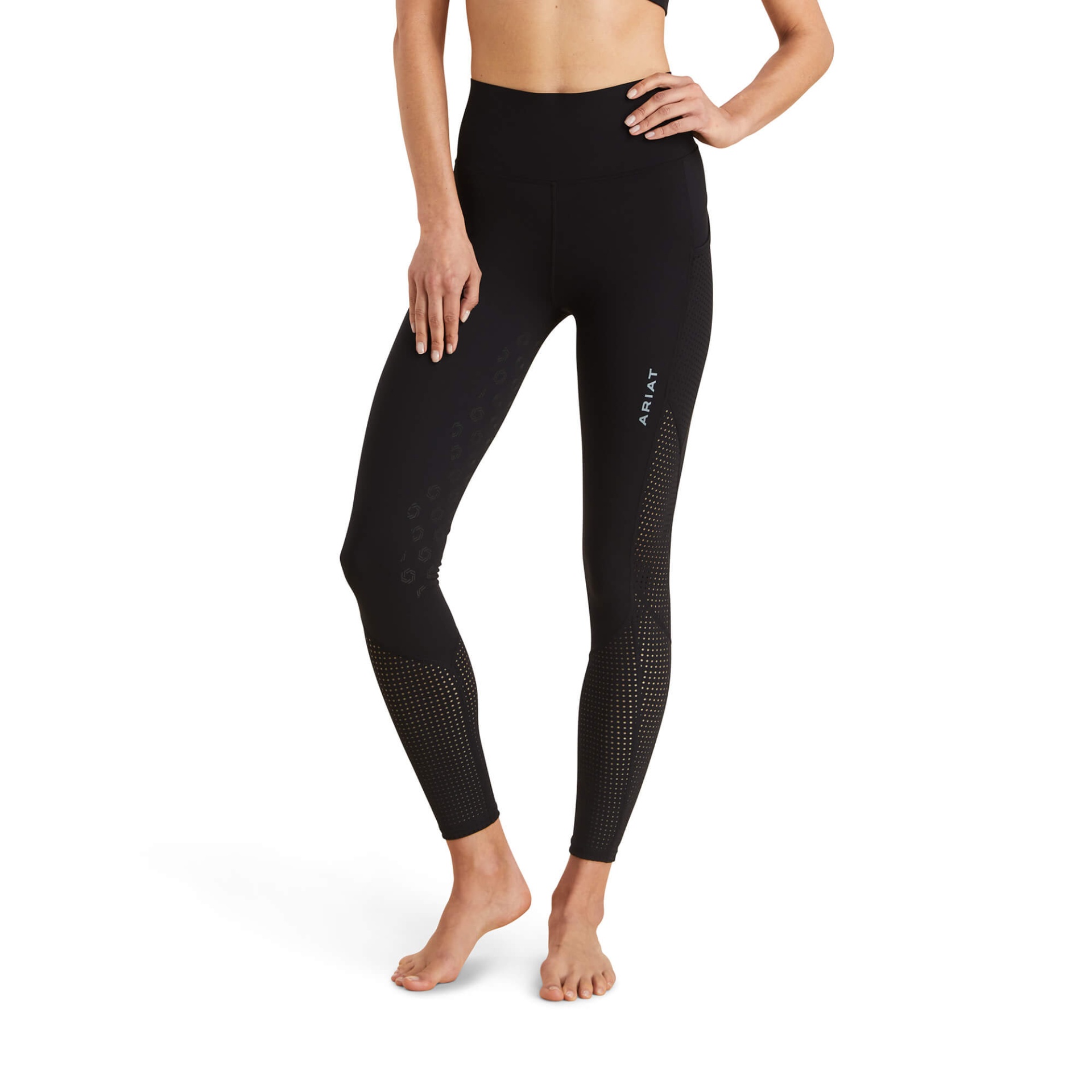 Leggings de Senhora ARIAT Breathe Eos Half Grip Leggings desportivas pretas com textura perfurada e texto ARAY, usadas por modelo