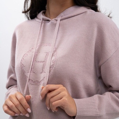 Sweatshirt rosa claro de malha com capuz e cordões, padrão em relevo circular com 'H'