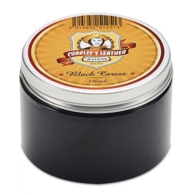 Frasco preto com tampa branca e rótulo amarelo de produto CHARLEE'S LEATHER RAVENS