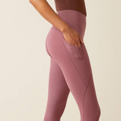 Calças de treino rosa com bolso lateral e detalhe perfurado