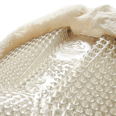 Tapete transparente com textura bolha e borda felpuda branca, logótipo SIMADER visível no centro.