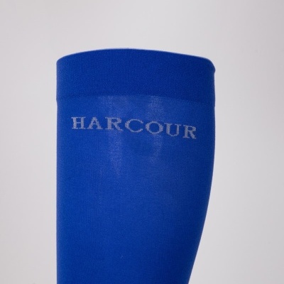 Meia azul royal com palavra HARCOUR em letras prateadas