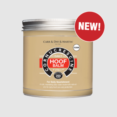 Pote dourado de bálsamo para cascos com tampo prateado e etiqueta colorida