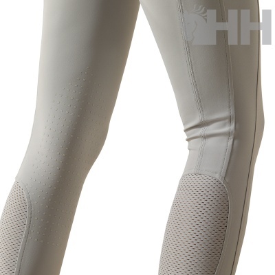 Calças justas bege com malha e padrão de quadrados em relevo