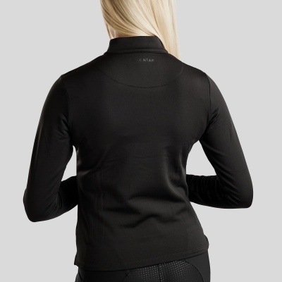 Camisola desportiva negra de manga comprida e calças justas negras com padrão texturado vista de costas