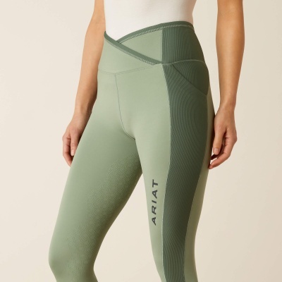 Leggings desportivas femininas verdes com design texturizado e cintura cruzada