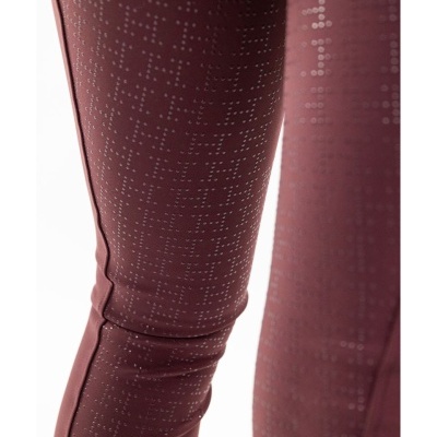 Calças justas bordô com padrão de pontos brancos