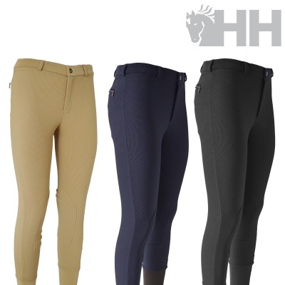 Três calças de equitação em cores bege, azul escuro e preto com bolsos laterais, exibidas em manequins e logótipo HH cinzento