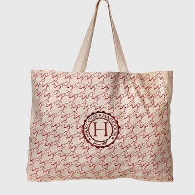 Mala bege com padrão de cavalos vermelhos e logótipo HARCOUR