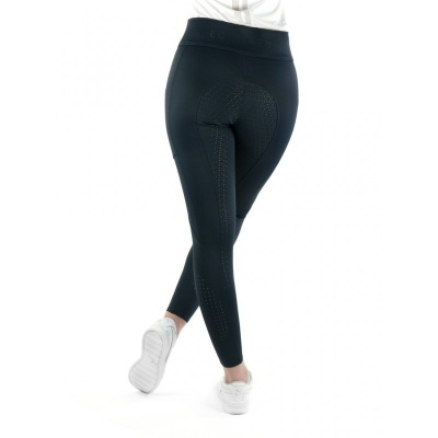 Leggings de desporto pretas com detalhes perfurados e ténis brancos