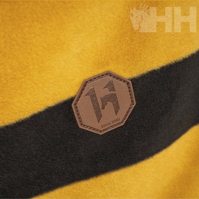 Etiqueta de couro octogonal com texto Since 1985 em tecido amarelo e preto