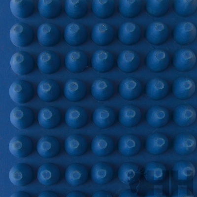 Superfície azul texturizada com pequenas protuberâncias arredondadas
