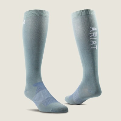 Par de meias compridas azuis com texto ARIAT em branco