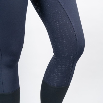 Leggings azuis escuras com painéis pretos e textura perfurada
