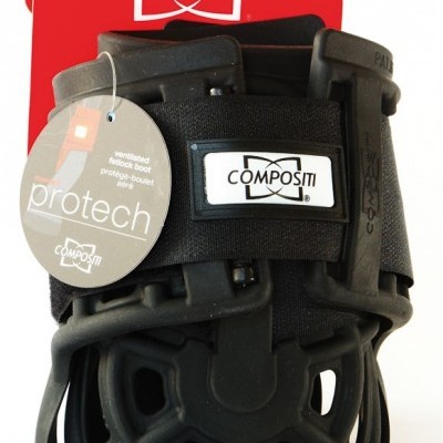 Protetor de canela preto COMPOSITI com embalagem vermelha