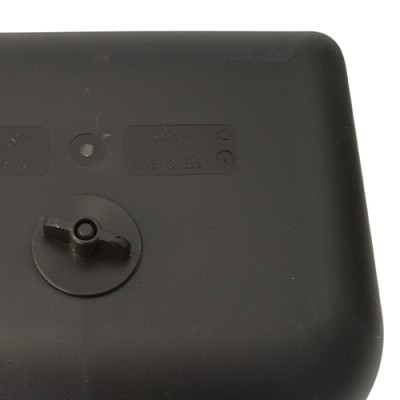 Peça plástica preta com mecanismo circular e alavanca