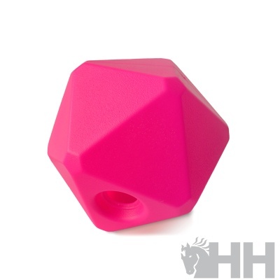 Objeto rosa poliedro com orifício em fundo branco