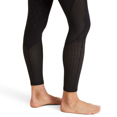 Leggings desportivas pretas com perfurações circulares nas pernas
