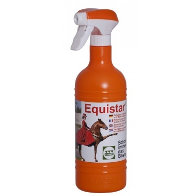 Frasco doseador laranja com pulverizador e rótulo de produto Equistar com cavalo e mulher.