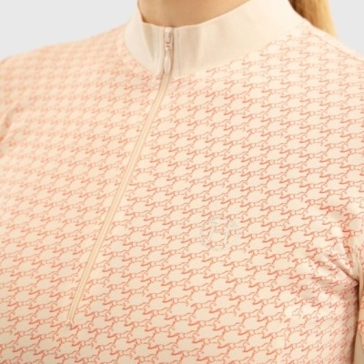 Blusa bege com padrão vermelho e fecho de correr frontal