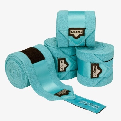 Bandagens azuis claras LeMieux enroladas