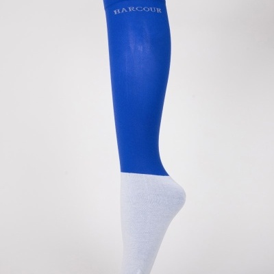 Meia alta azul e cinza com texto HARCOUR