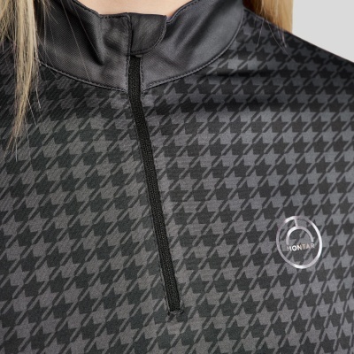 Roupa desportiva preta com padrão pied de poule e fecho curto