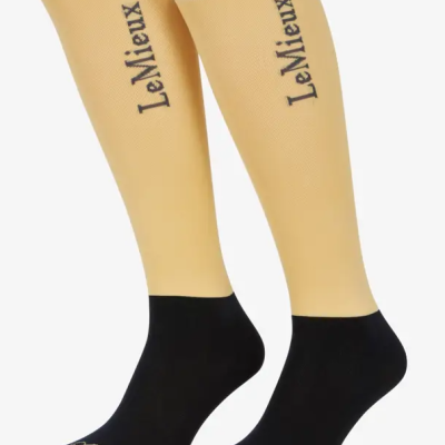 Meias compridas amarelas e pretas com texto LeMieux