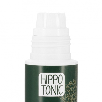 Frasco plástico branco com escova e rótulo verde com texto HIPPO TONIC