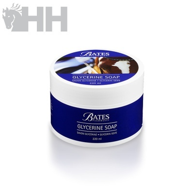 Pote de sabonete de glicerina Bates Saddles azul e branco com tampa branca e texto azul e branco.