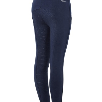 Calças de equitação azuis escuras com padrão de pontos antiderrapantes e logo 'horze'