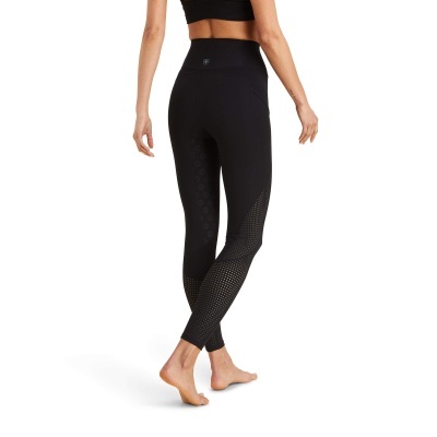 Leggings pretas femininas com padrão perfurado nas pernas