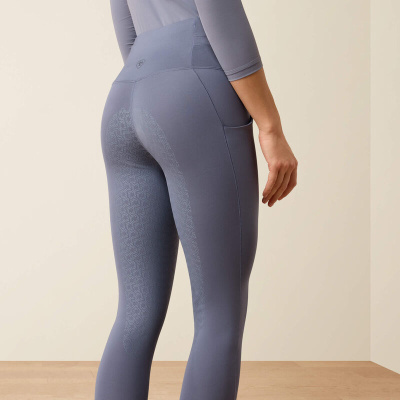 Leggings de treino azul cinzento com padrão geométrico texturizado e bolso lateral, vista traseira