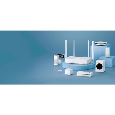 Dispositivos eletrônicos brancos variados sobre fundo azul