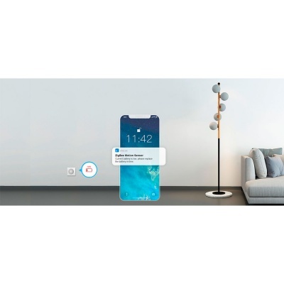 Sala de estar moderna com candeeiro de pé e sofá cinza