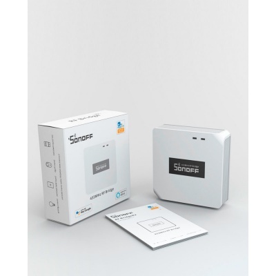 Dispositivo Sonoff branco com caixa e manual