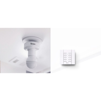 Lâmpada LED branca no teto com interruptor de parede branco com botões