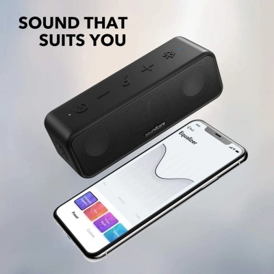 Coluna de som preta com smartphone a mostrar equalizador e texto 'SOUND THAT SUITS YOU'