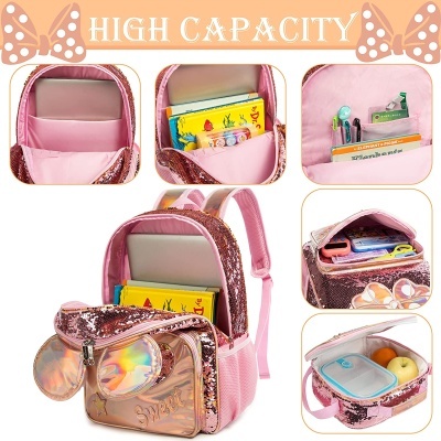 Mochila rosa com brilhos dourados e várias divisões internas