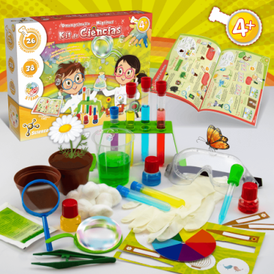 Kit de ciências infantil com tubos de ensaio, lupa, luvas, flores artificiais, livro e acessórios coloridos sobre mesa