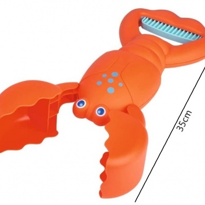 Brinquedo de plástico laranja em forma de lagosta com pente azul