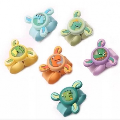 Cinco anéis de silicone coloridos para crianças com figuras de dinossauros