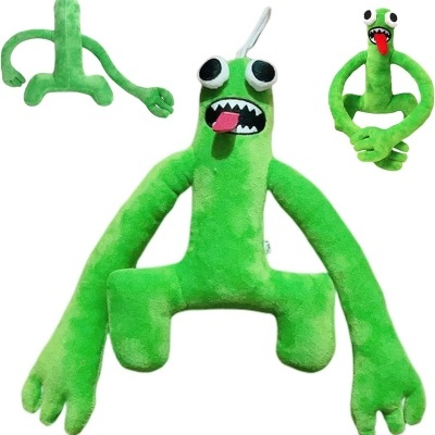 Brinquedo de peluche verde com olhos grandes e boca aberta