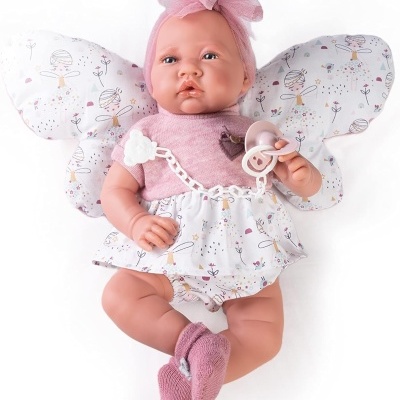 Boneca bebé realista vestida com rosa e com asas decorativas
