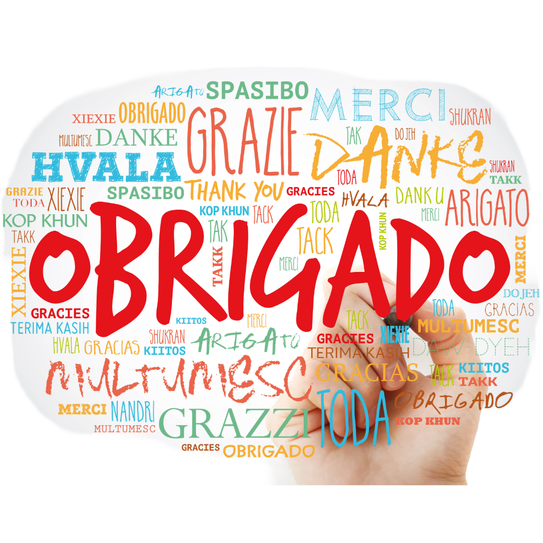 Mão segurando bola de pensamento branca com palavras de agradecimento em várias línguas
