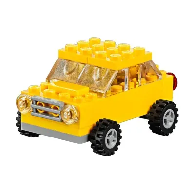 Carro de brinquedo de blocos amarelos com rodas e janelas transparentes
